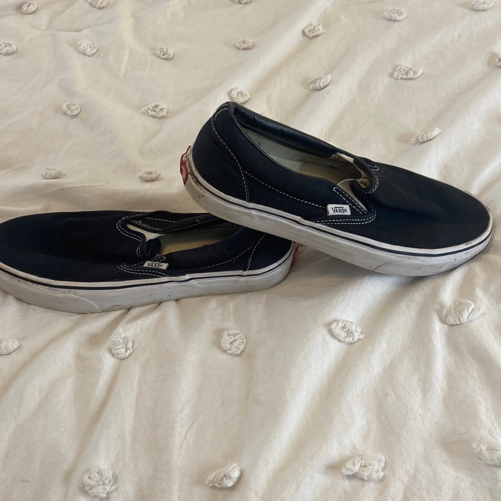 Black slip-on Vans